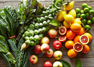 a group of fruits and vegetables on a wood surface Healthy Weight Loss Diets South Yardley